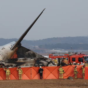 韩国客机起火已致58人死亡